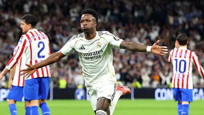 Vinicius double helps Real Madrid edge Atletico thriller