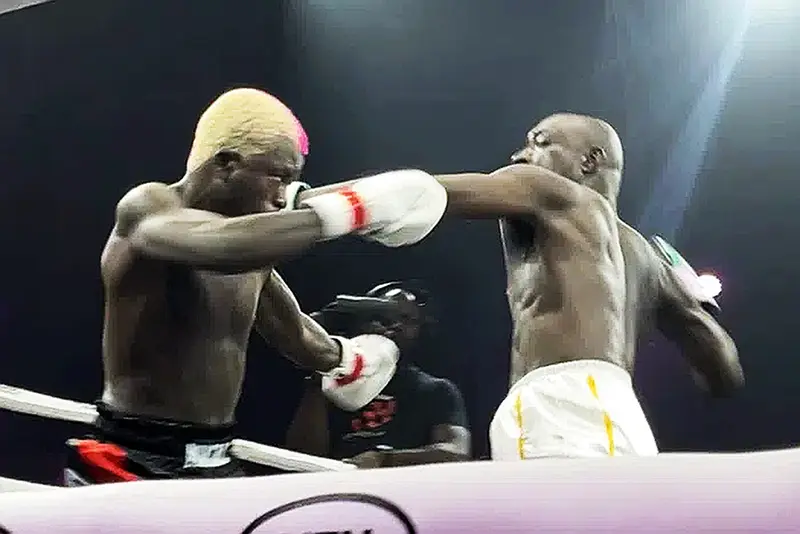 E-Money gifts Carter Efe N50m after victory over Portable