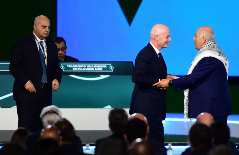 Gianni Infantino's attempt at Israel-Palestine handshake backfires
