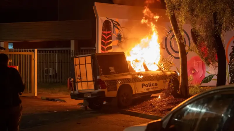 Violence in Australian town after arrest of man over girl's murder