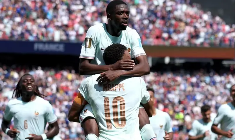 Dembele hits terrific treble as France top group