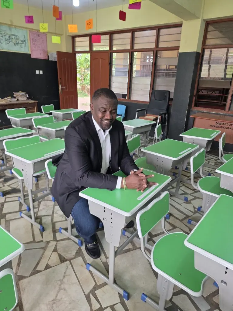 John Dumelo donates school desks to Roman Ridge M/A Basic School
